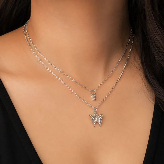 "Silver butterfly pendant necklace
featuring a crystal-studded butterfly charm on a delicate silver-tone chain. An elegant and lightweight necklace for women, perfect for everyday wear, layering, gifting, and special occasions."