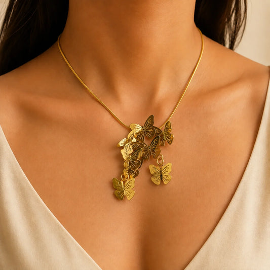 Demi fine 18K gold plated butterfly swarm pendant with laser cut wings layered