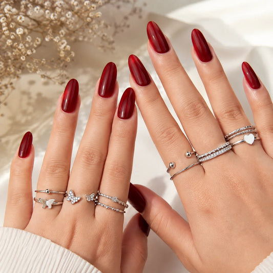 "Silver-toned ring combo
for women featuring twisted, textured and minimalist stackable ring designs."
