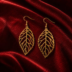 Gold leaf dangle earrings with cutwork vein design. Lightweight gold-plated fish-hook earrings with leaf silhouette. Minimal western jewelry for daily and office wear.