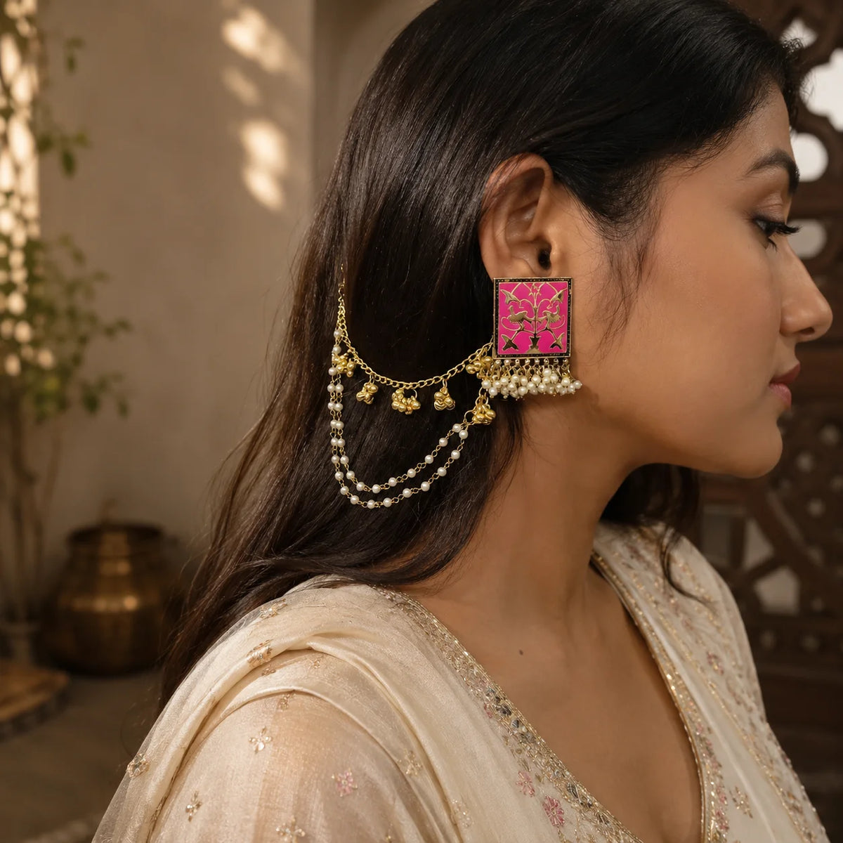 "Handcrafted pink Meenakari
 earrings with floral enamel detailing, gold-tone square design, and  pearl tassels. Traditional ethnic statement earrings for women, perfect for weddings, festive celebrations, Navratri, Diwali, Haldi, Mehendi, and Indian ethnic wear."
