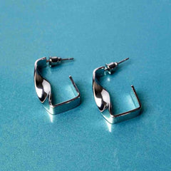 Silver Tonned Twisted Drop Earrings