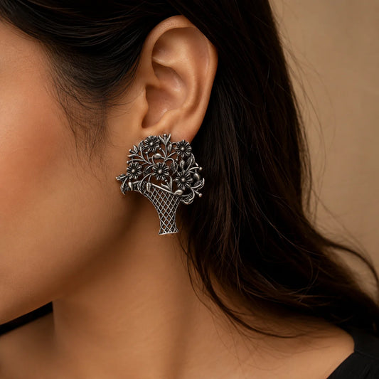 Oxidised silver flower vase stud earrings with floral bouquet design for women
