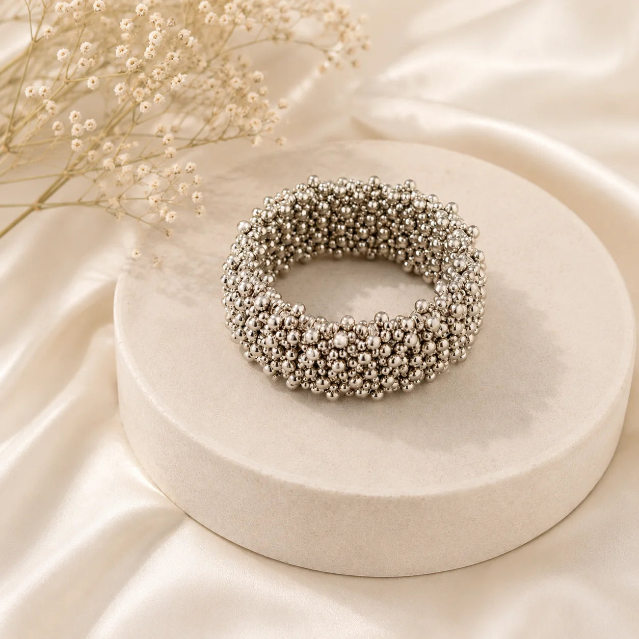 Oxidised silver spiral bracelet with tiny beads. Flexible coil wrap bracelet in antique silver finish. Tribal boho arm jewellery.
