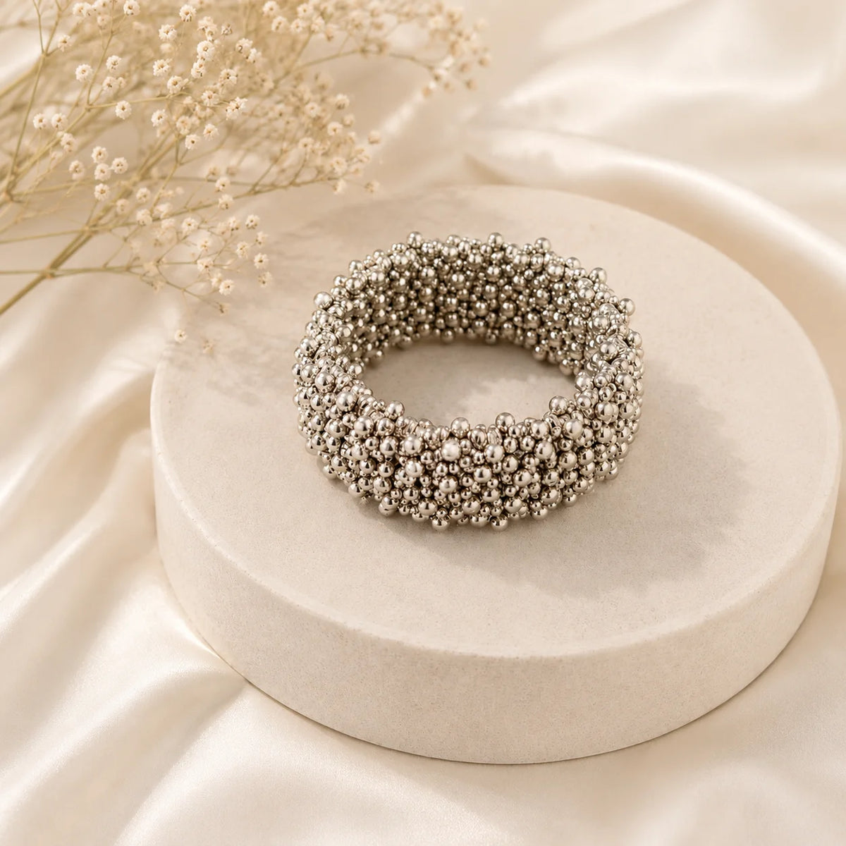 Oxidised silver spiral bracelet with tiny beads. Flexible coil wrap bracelet in antique silver finish. Tribal boho arm jewellery.
