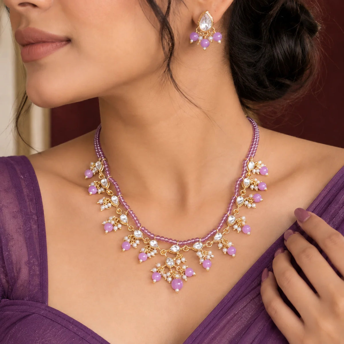 Lilac beaded kundan necklace set with matching earrings, featuring heart-shaped kundan stones, pearl accents, gold-toned detailing, and lilac bead drops.
