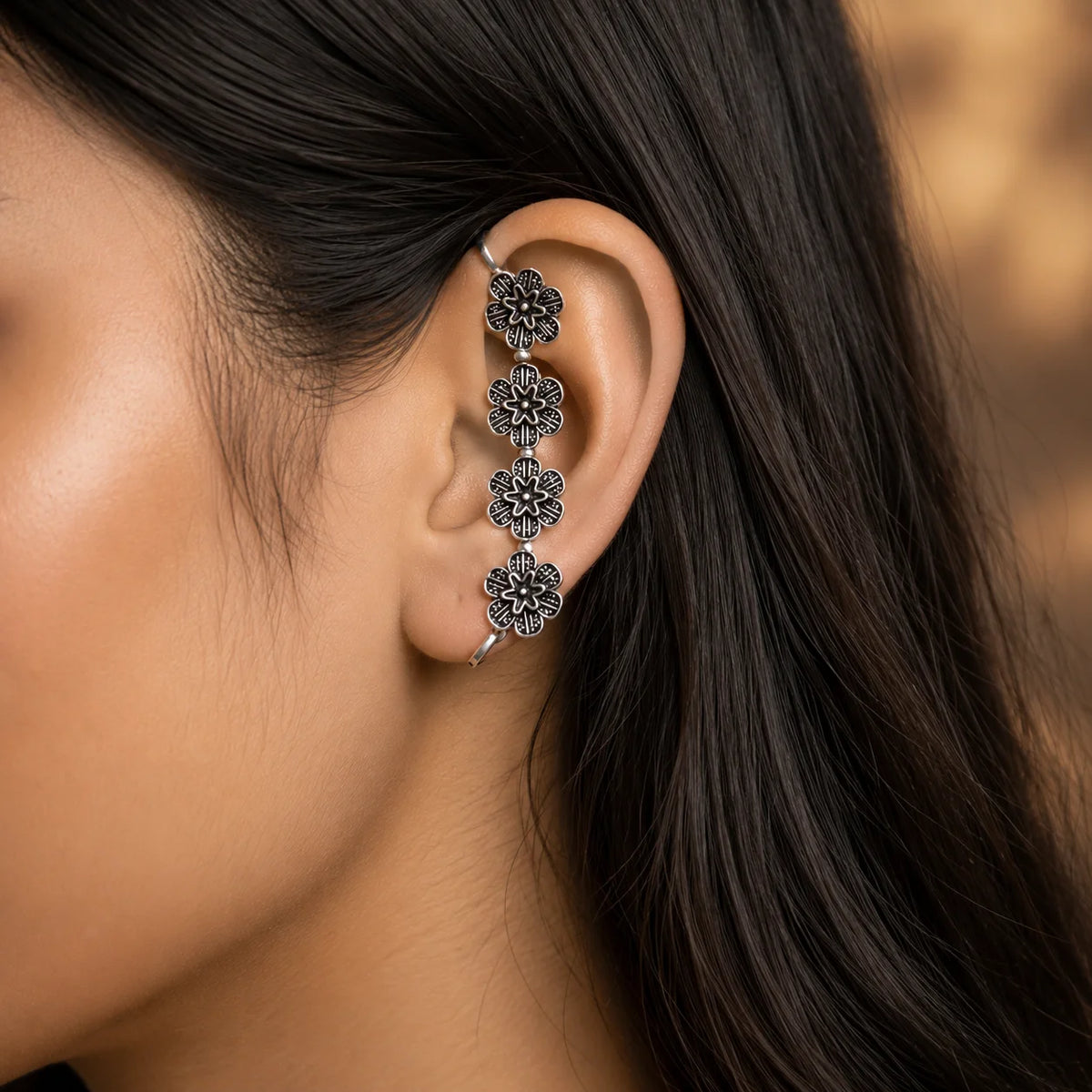  Tribal oxidised ear climber cuff with 4 connected flowers and mesh pattern

