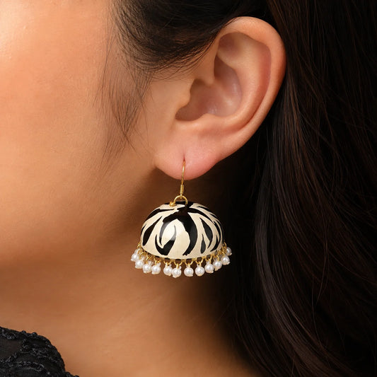 "Handcrafted black and offwhite
 Meenakari jhumka earrings with delicate white pearl bead drops. Traditional ethnic earrings for women, perfect for weddings, festive celebrations, cultural events, and Indian ethnic wear."
