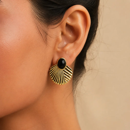 Gold tone black stone fan stud earrings with linear ridges
