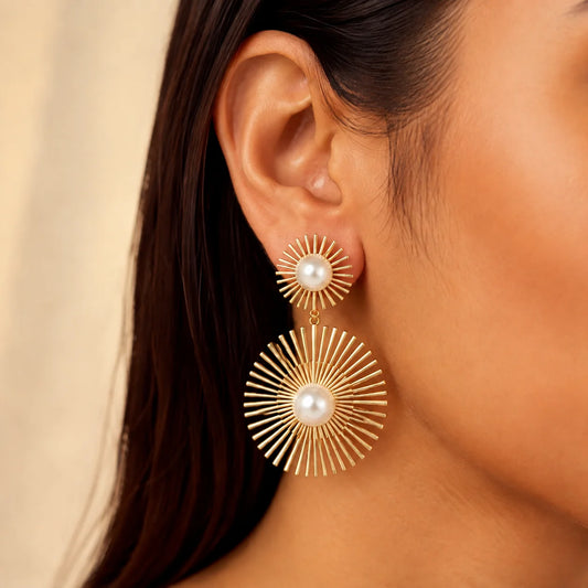  Gold tone pearl sunburst dangle earrings with double tier design

