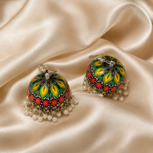 Printed enamel jhumka earrings with pearl drops. Colorful floral dome with silver base. Traditional festive earrings.

