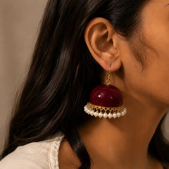 Gold maroon enamel dome earrings with pearl fringe. Traditional jhumkas with fishhook closure. Festive ethnic earrings.
