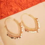 Elegant inverted V-shaped drop earrings crafted from textured metal in an antique gold-tone finish, featuring small dangling circular discs and a secure hinged back closure.