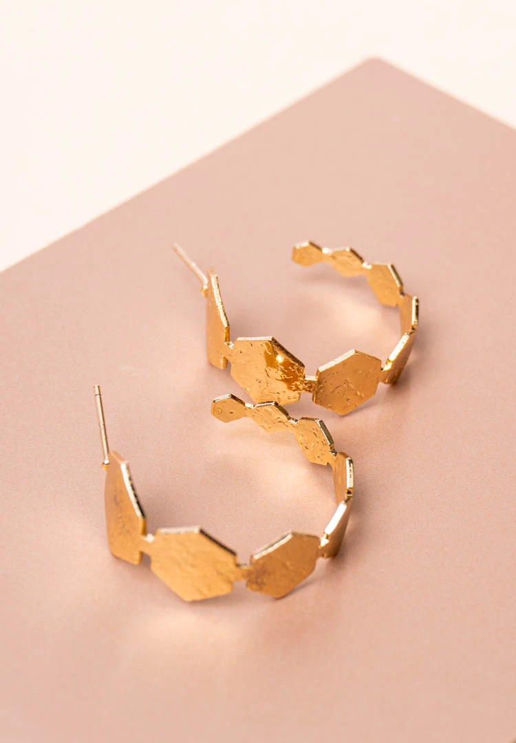 197-Th Trendy mini C-hoop earring with a polished gold-tone,geometric pattern finish, adorned with a hexagonal shaped design and , push-back post