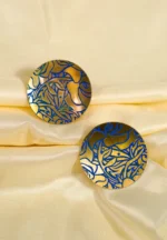 Lightweight and elegant snake chain bracelet with silver-tone finish, beaded details, a dangling heart charm, and a bell-inspired charm, secured with a lobster claw clasp.