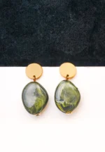 Chic oval marble drop earrings with a sleek round design, accented by a gold-tone top and finished with a push-back closure