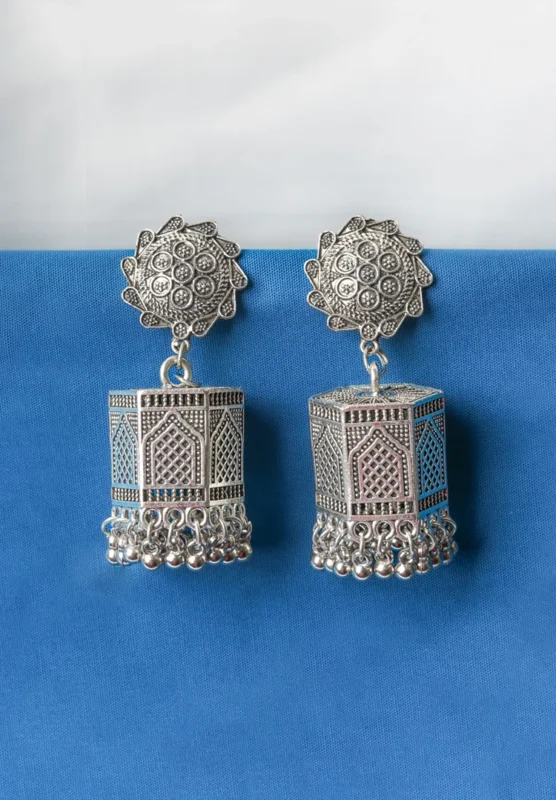 Lovely antique-finish oxidised metal jhumka earrings with a floral design, delicate dangling metallic beads, a classic hexagonal design, ghungroo at the end and a push-back closure