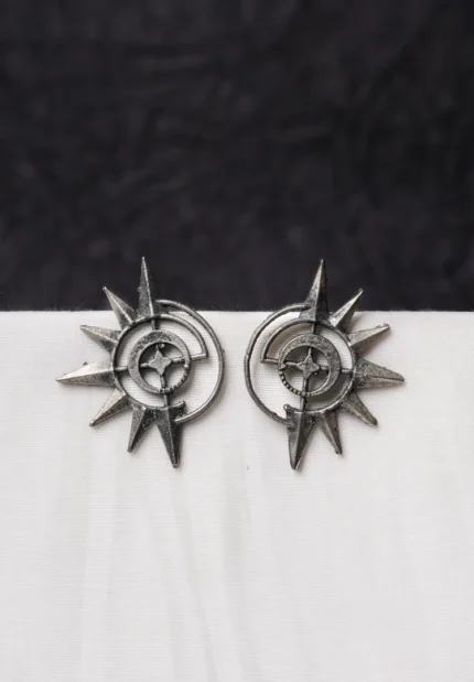 Intricately crafted oxidized C-hoop earring with floral detailing, offering a vintage charm, and finished with a push-back closure.