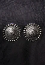 Statement oxidized silver-tone circular stud earring with an elaborate intricate design, highlighted by a beaded border for a classic touch, finished with a push-back closure