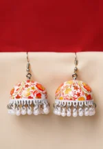Jhumka earring with colourful floral meenakari detailing and silver-tone finish adorned with a series of small circular pearl beads at the edge and a french hook closure