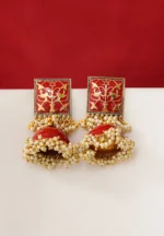 Vintage-inspired oxidized silver jhumka earring with an intricately detailed circular top, chain tassel layers, and small ghungroo embellishments and a push back closure.