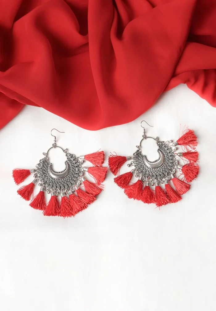 Craftsmanship oxidized silver crescent dangle earring featuring symmetrical geometric detailing, dangling circular beads, and colorful tassel highlights