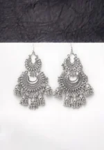 Fusion-style oxidised silver dangle earring featuring interconnected crescent elements, adorned with small jhumka-inspired details and ghungroos for a traditional touch, secured with a curved hook closure.