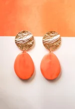 Vibrant bright orange acrylic dangle earring featuring a soft matte texture, an elegant gold-tone top, and a push-back fastening