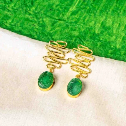 Statement organic metal drop earrings with a textured gold and dark red finish, featuring an oval-shaped red druzy stone and a secure push-back closure