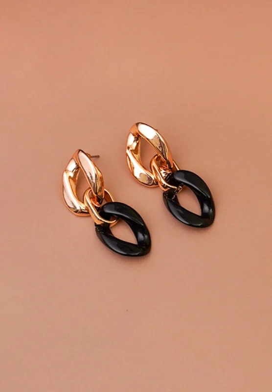 Sleek and stylish drop earrings featuring interlocking gold ovals and a statement black oval accent, perfect for effortless elegance.