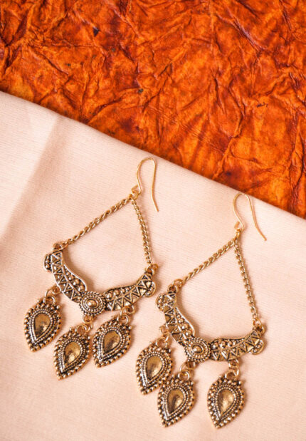 Stylish geometric metal dangle earrings with a silver finish along with colorful enamel detailing, delicate chain tassels with circular beads, and a push-back closure.