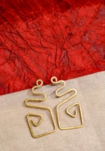 Minimalist brass earrings with an irregular abstract design, subtle texture detailing, and a classic push-back closure.
