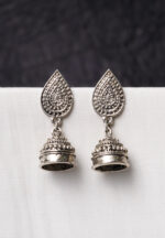 Traditional oxidized silver jhumka earring featuring fine intricate detailing, a teardrop-shaped top, and a secure push-back closure