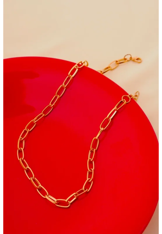 Fashion-forward gold-tone gauge wire necklace with a polished sheen and a durable lobster claw closure