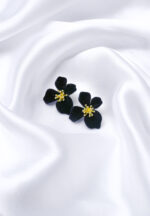 Delicate flower stud earring with a gold-tone finish, red roses and green leaves gemstone textured golden center, and a hinged back.
