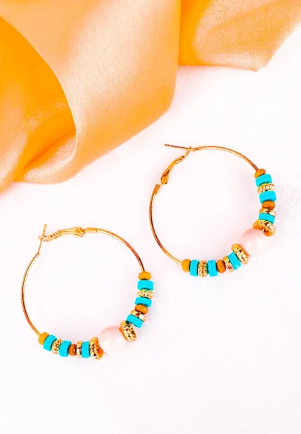 Multicolor beaded hoop earrings with pink, yellow, purple, and orange accents.