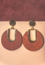 Elegant wooden dangle earring featuring a circular design framed with a gold-tone finish and a push-back closure.