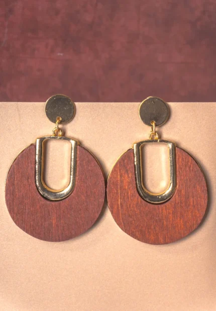 Elegant wooden dangle earring featuring a circular design framed with a gold-tone finish and a push-back closure.