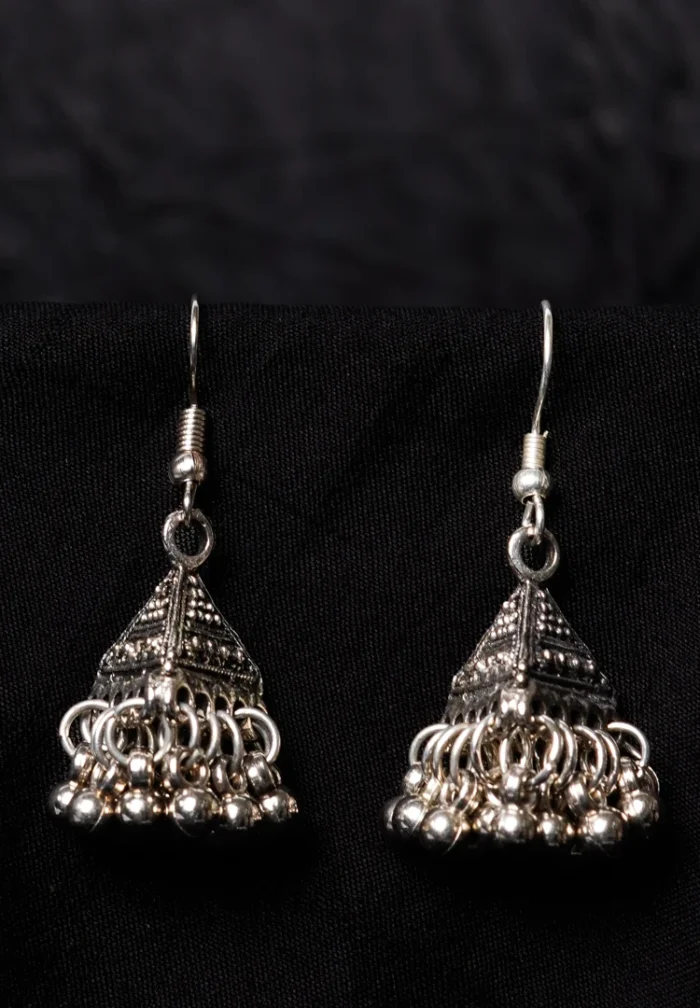 Antique-inspired oxidized silver-tone triangular jhumka earring, showcasing fine craftsmanship with ghungroos along the edge and a secure French hook closure.