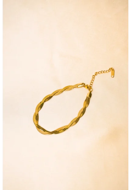 Elegant adjustable curb chain bracelet in a gold-tone finish, featuring a curved metallic wire centerpiece with a dangling spherical charm and a secure spring ring clasp.