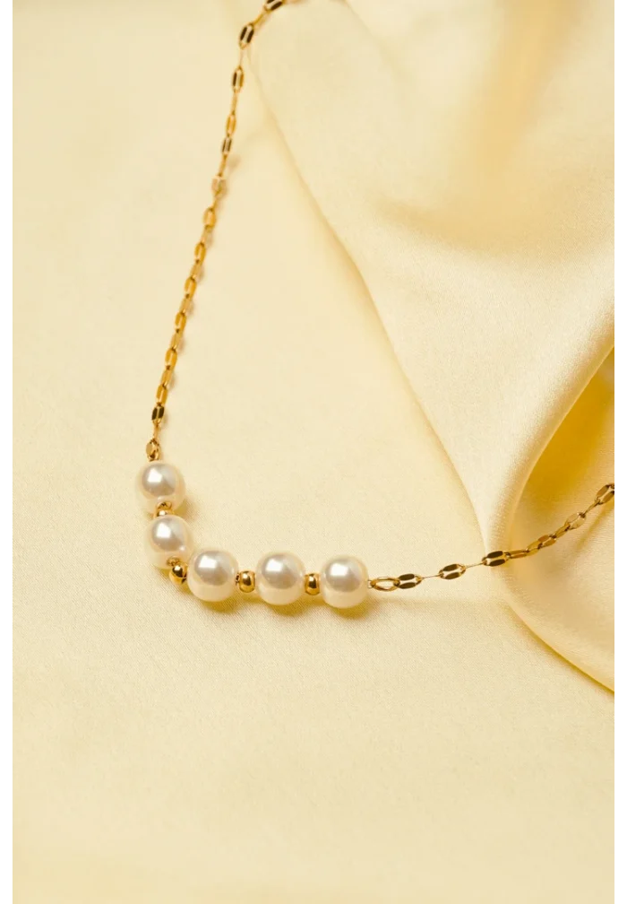 Elegant polished gold-tone sequin chain necklace featuring a graceful arrangement of pearls and golden mini beads at the center, finished with a lobster clasp.