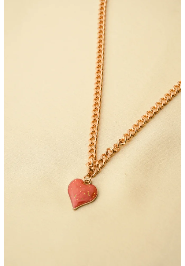 Elegant adjustable curb chain bracelet in a gold-tone finish, featuring a curved metallic wire centerpiece with a dangling spherical charm and a secure spring ring clasp.