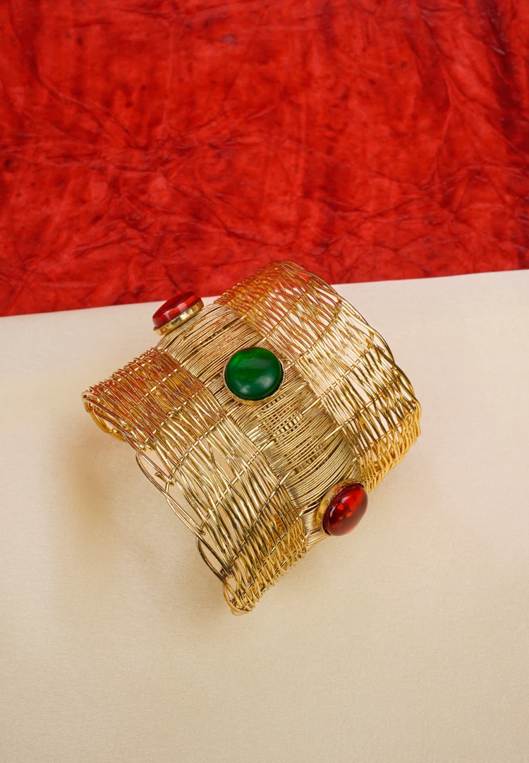 304-Th Elegant metal cuff bracelet showcasing teardrop and circular design at the edges, beautifully enhanced with a lively mix of vibrant colors.