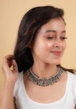 Timeless oxidized silver-tone curb chain necklace adorned with circular beads and tiny ghungroos, finished with a sturdy lobster clasp for a secure fit.