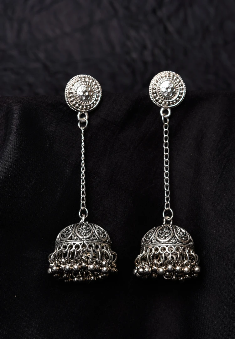 346-Th Traditional oxidized silver jhumka earring featuring fine intricate detailing, a floral-designed top, and a secure push-back closure.