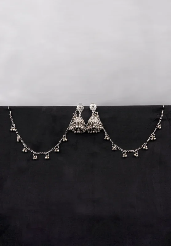 Antique-style silver-tone jhumka ear hair chain earring featuring teadrop top, a chain tassel detailed with pearl beads and a delicate chain with circular line charms, finished with a push-back closure, with ghungroos at the end with a curved hook closure.
