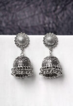 Oxidised jhumka earrings with complex floral detailing, featuring a finely detailed circular top, delicate detailing, and ghungroos at the bottom, secured with a push-back closure