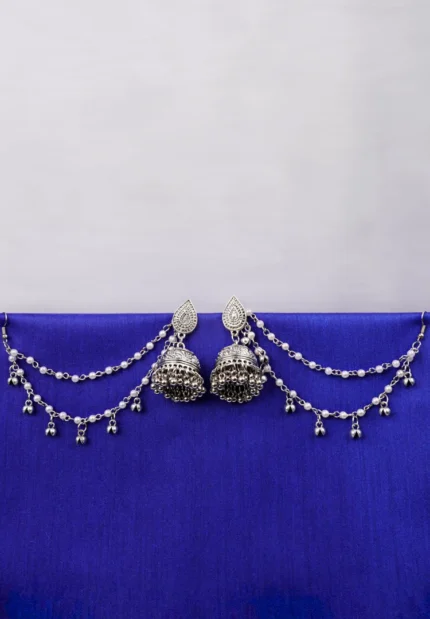 Antique-style silver-tone jhumka ear hair chain earring featuring teadrop top, a chain tassel detailed with pearl beads and a delicate chain with circular line charms, finished with a push-back closure, with ghungroos at the end with a curved hook closure.