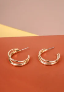 Trendy mini C-hoop earring with a polished silver-tone, golden tone/crimson red finish featuring dangling reddish stone chip beads at the bottom and , push-back post.