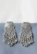 Stylish geometric metal dangle earrings with a silver finish along with fine detailing, delicate chain dangly geometric designs push-back closure.